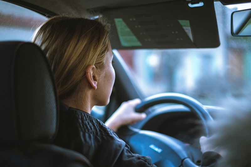 Close-up shot of a woman driving 