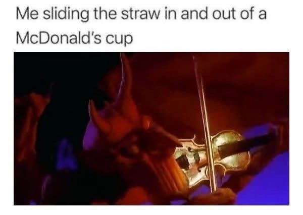 Me sliding the straw in and out of a McDonald's cup
