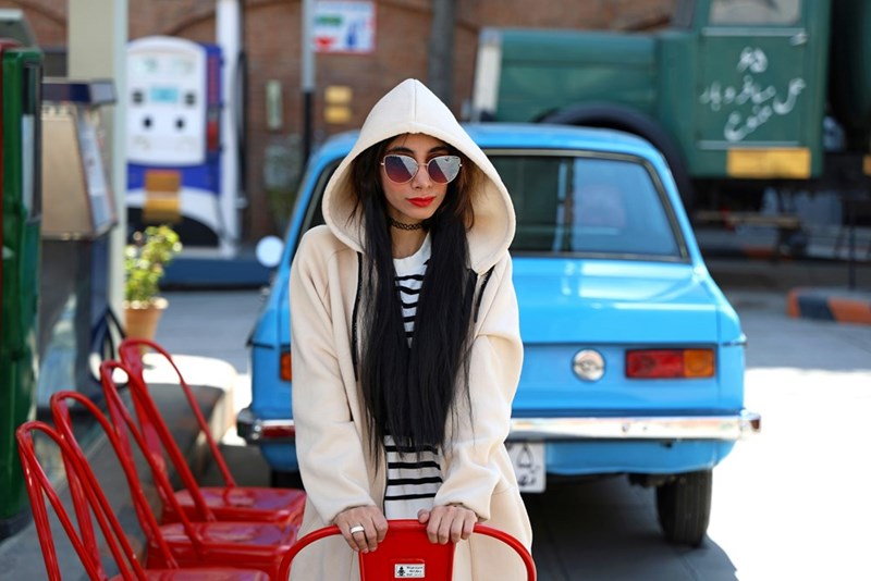 Woman waits around for her husband to assist her.