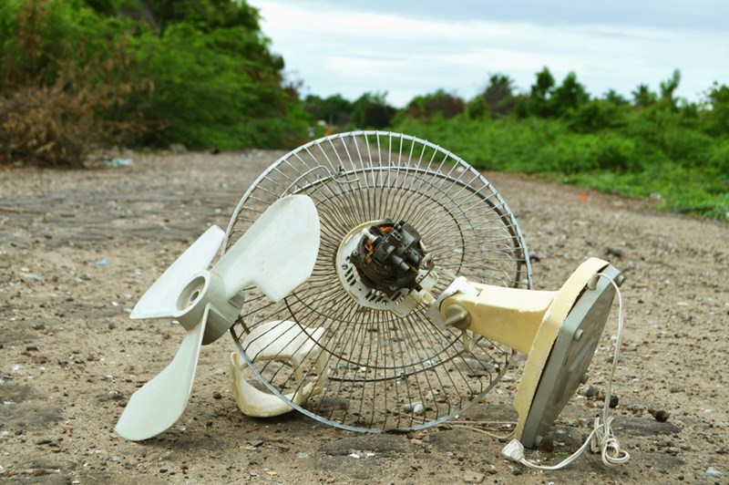 Broken fan on the ground.