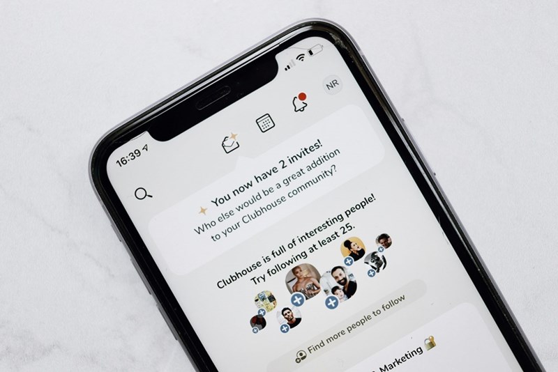 A group chat invite notification appears on a iphone screen