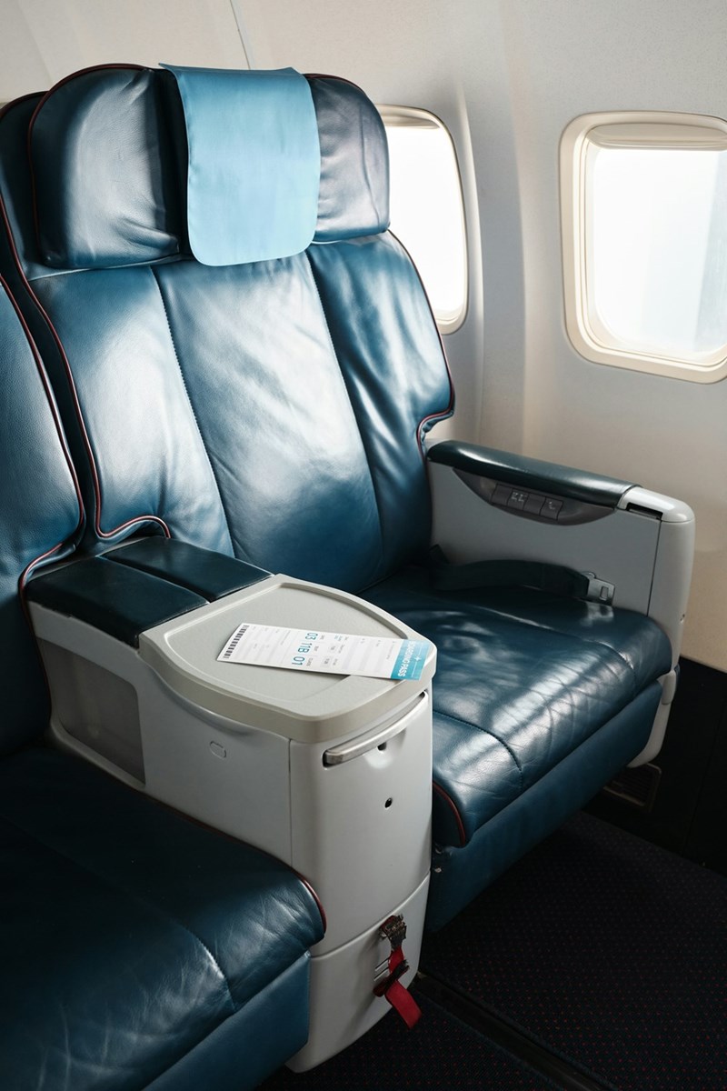 Upgraded business class or first class seat in an airplane for a commercial flight