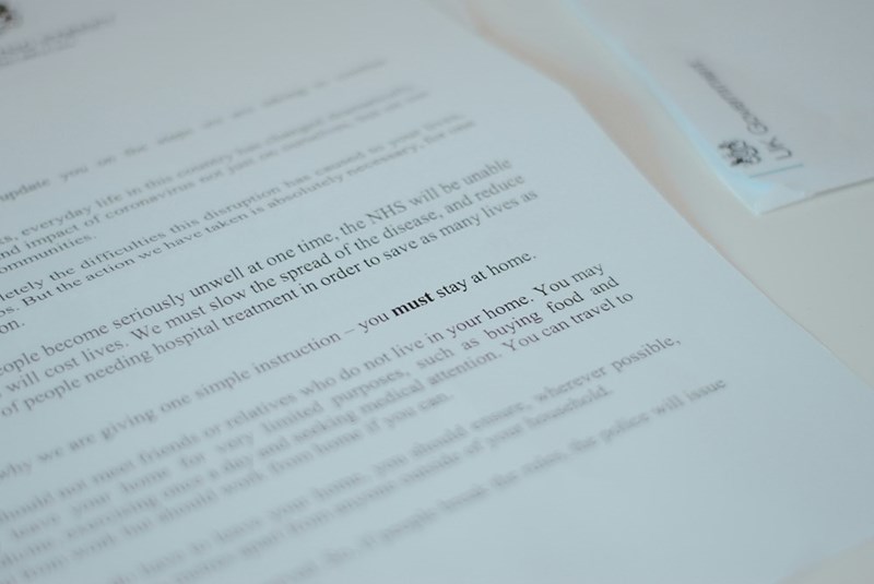 A printed letter with a large text written on it.