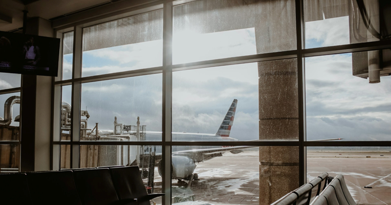 View of an airplane from inside a gate in the airport