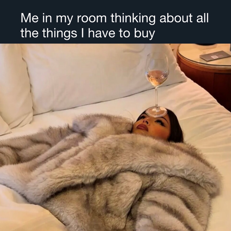 Me in my room thinking about all the things I have to buy