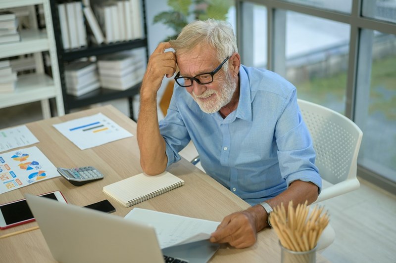 Calm boss playing music in an online meeting to reduce stress. 