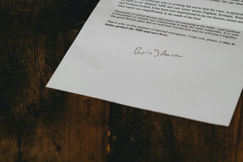 A resignation letter sits on a desk.