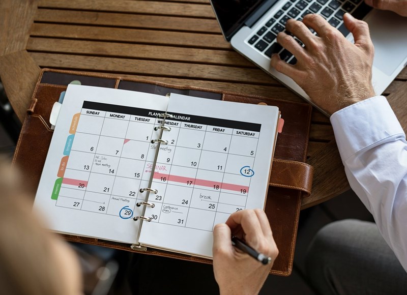 person using their personal organizer