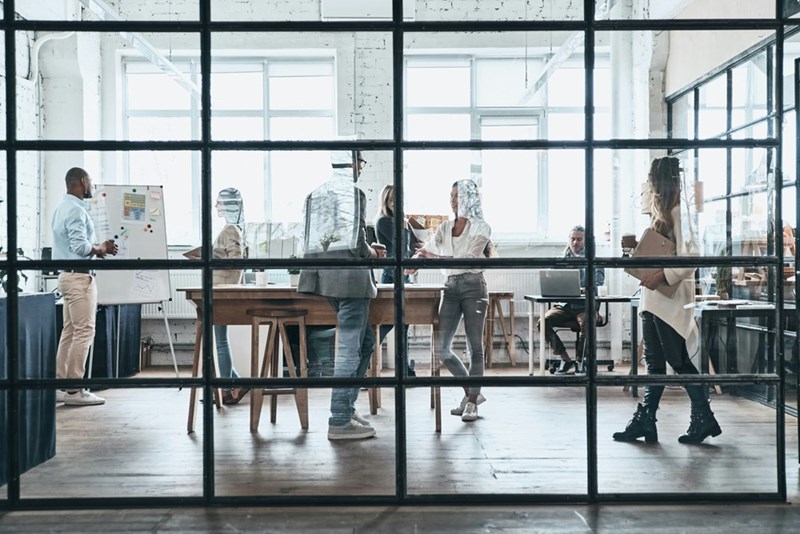 Office environment full of workers.