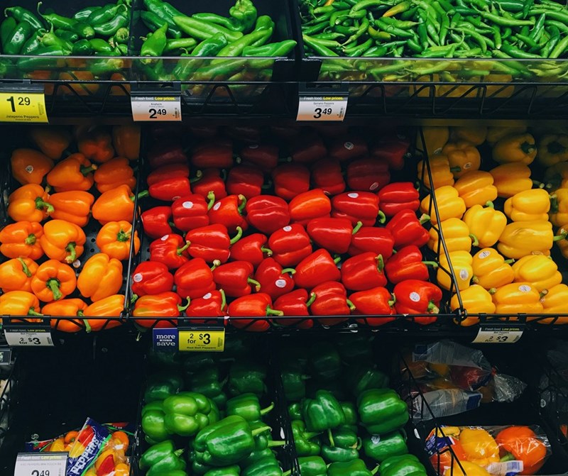 Brightly colored peppers in a supermarket.