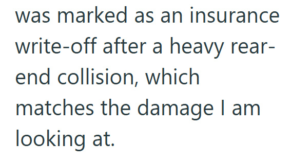 was marked as an insurance write-off after a heavy rear- end collision, which matches the damage I am looking at.