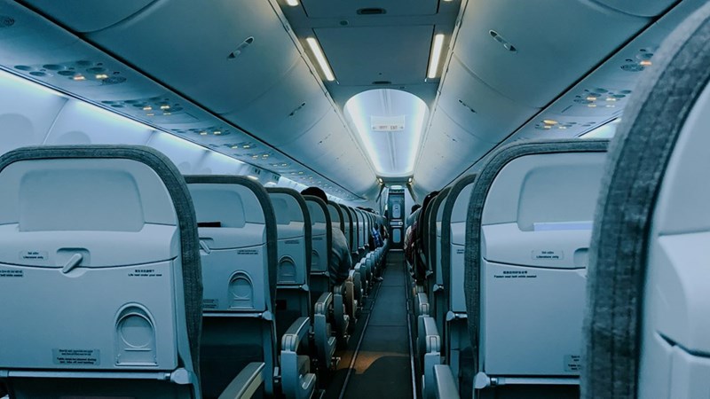 Empty aisle of airline passengers on a flight