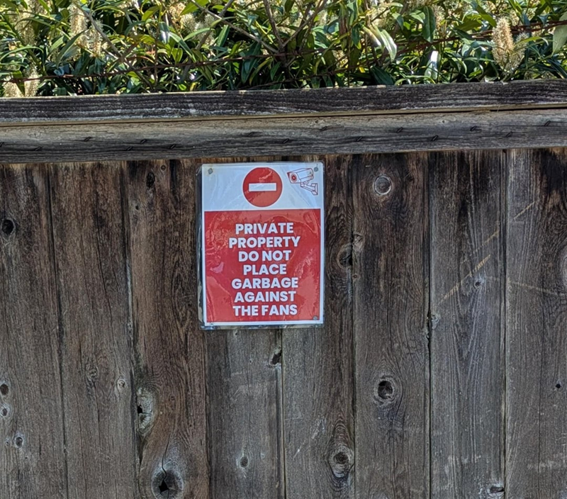 PRIVATE PROPERTY DO NOT PLACE GARBAGE AGAINST THE FANS