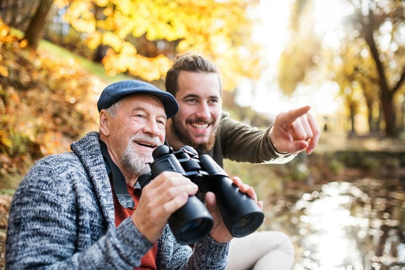 Father and son spend time together sightseeing on vacation.