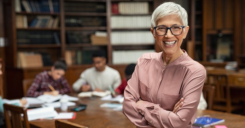 Smiling University Professor in Library