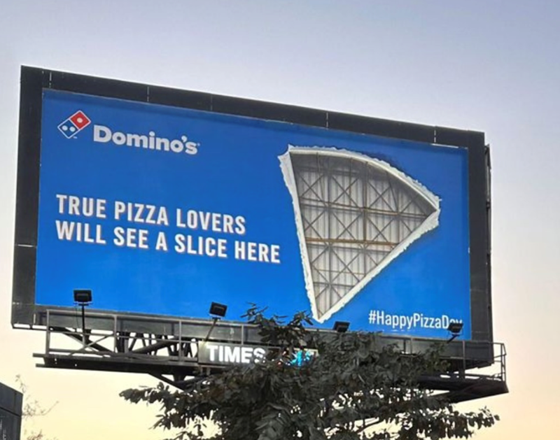 Domino's TRUE PIZZA LOVERS WILL SEE A SLICE HERE #HappyPizzaD TIMES