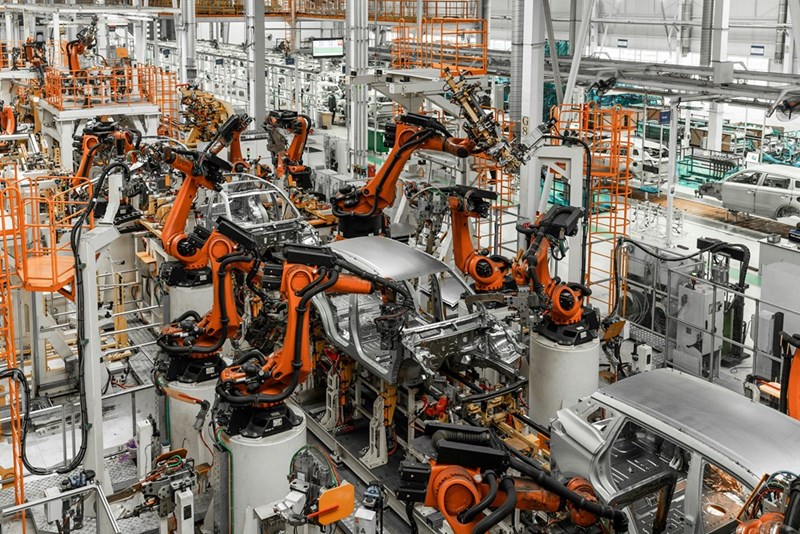 Car bodies are on assembly line factory for production of cars