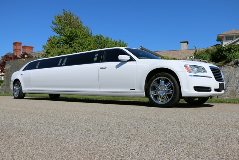A large white limousine car