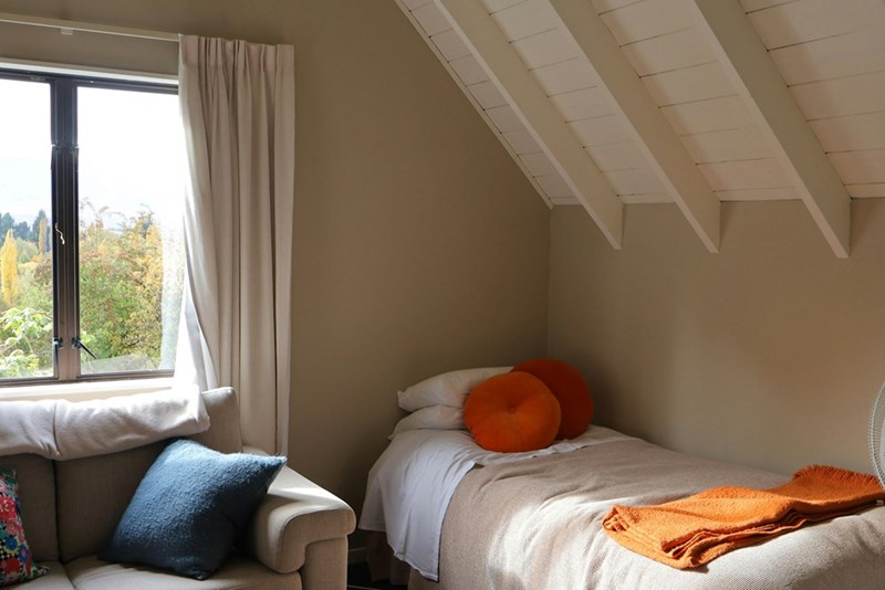 A guest room, which could be used to house a friend who is responsible enough to keep a part-time job, especially when they're struggling with money.