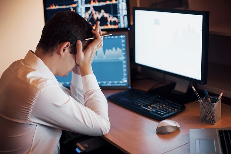 The model depicts a businessman feeling distressed about his business failing, leading him to give his employees major five-figure pay cuts.