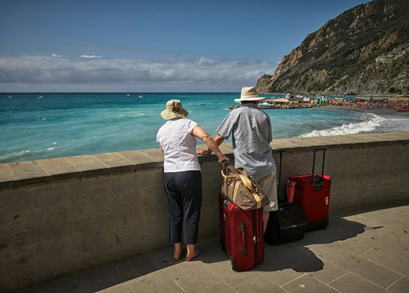 A representation of two entitled parents, who are taking expensive vacations using the money that their teenage son won in the lottery. 