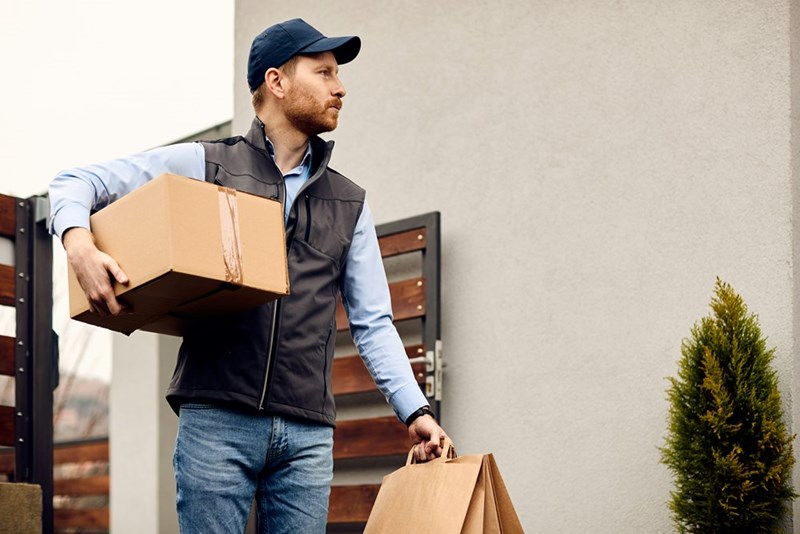 Delivery driver thinks about leaving his job while delivering packages and bags, in a representation from a model.