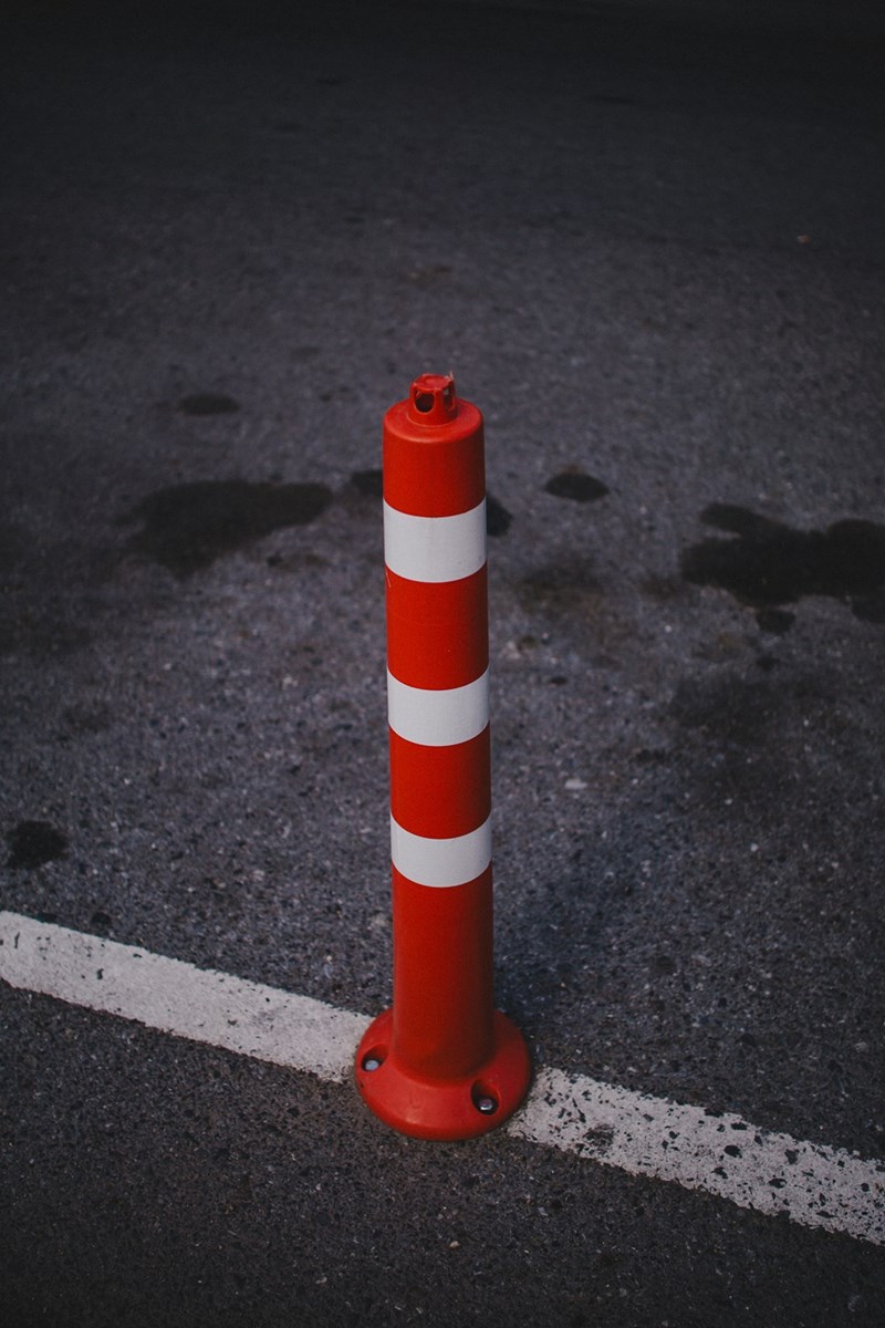 This model depicts a parking bollard used to block a neighbor's access to a homeowner's private driveway while he's away at work.