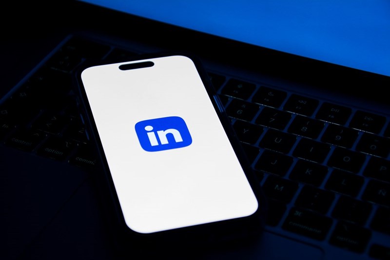 a phone with the linkedin app open