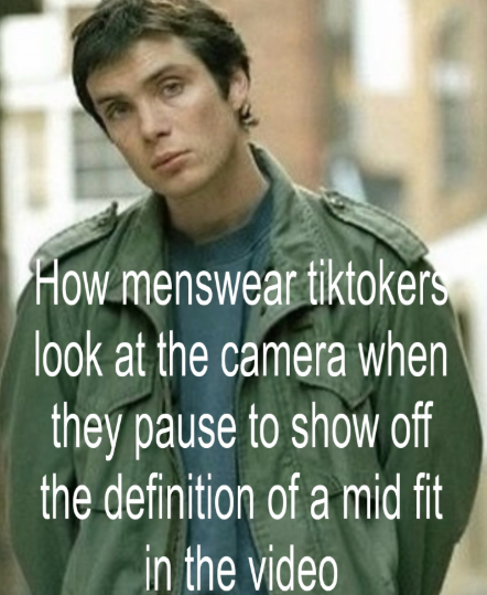 How menswear tiktokers look at the camera when they pause to show off the definition of a mid fit in the video