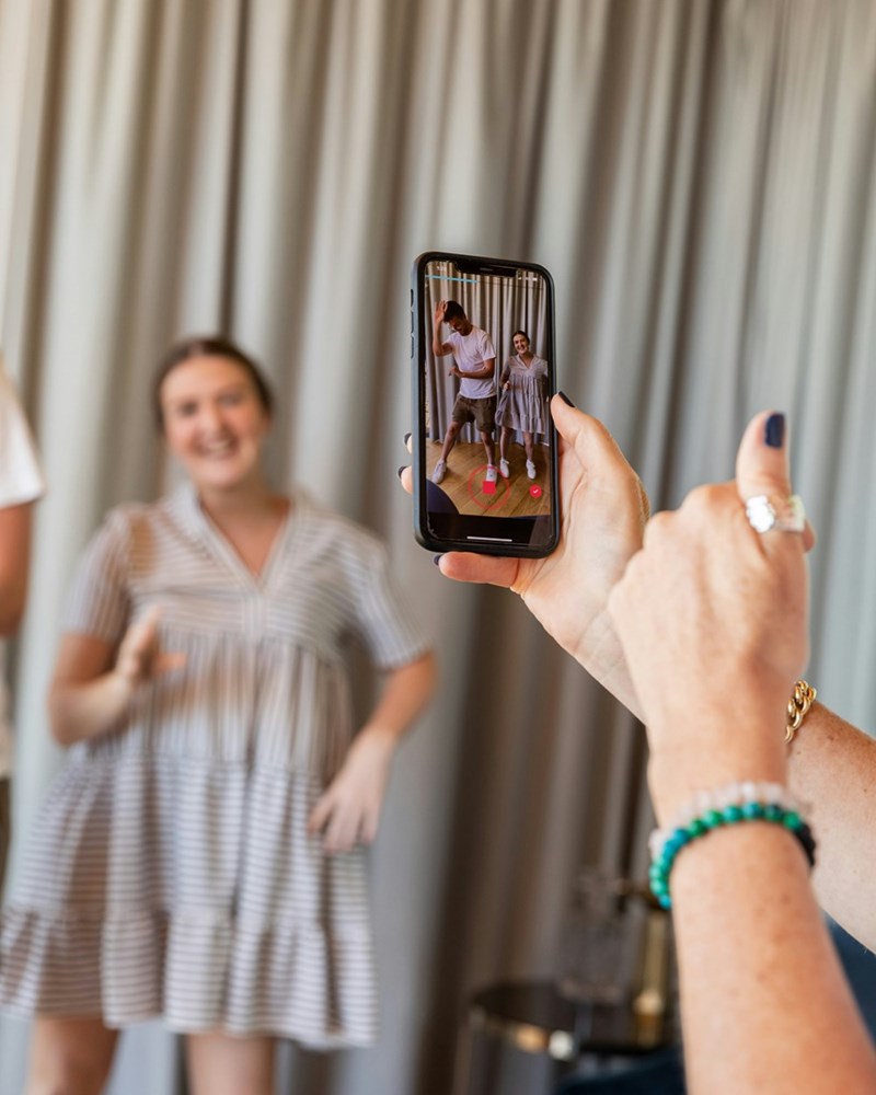 Influencer posing for a phone, model image