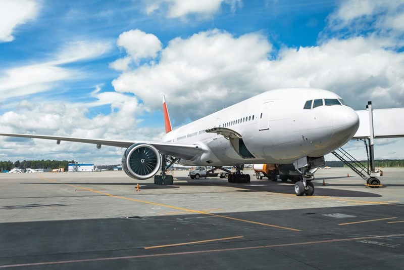 An airplane prepares for takeoff on the tarmac