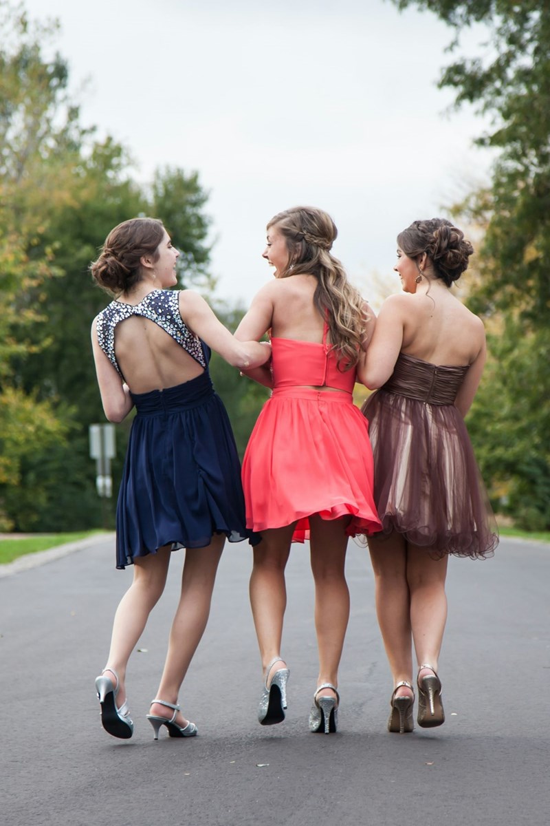 three woman walking together during dawn