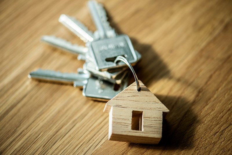 A model of a spare house key for emergency access between family members.