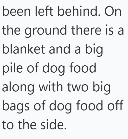 been left behind. On the ground there is a blanket and a big pile of dog food along with two big bags of dog food off to the side.