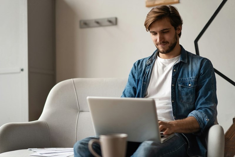 A representation of an employee reviewing projects from a home office.