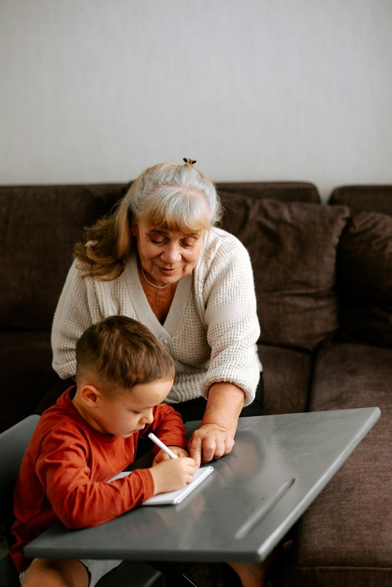 A grandmother taking care of her grandson before she was too sick to do so. 
