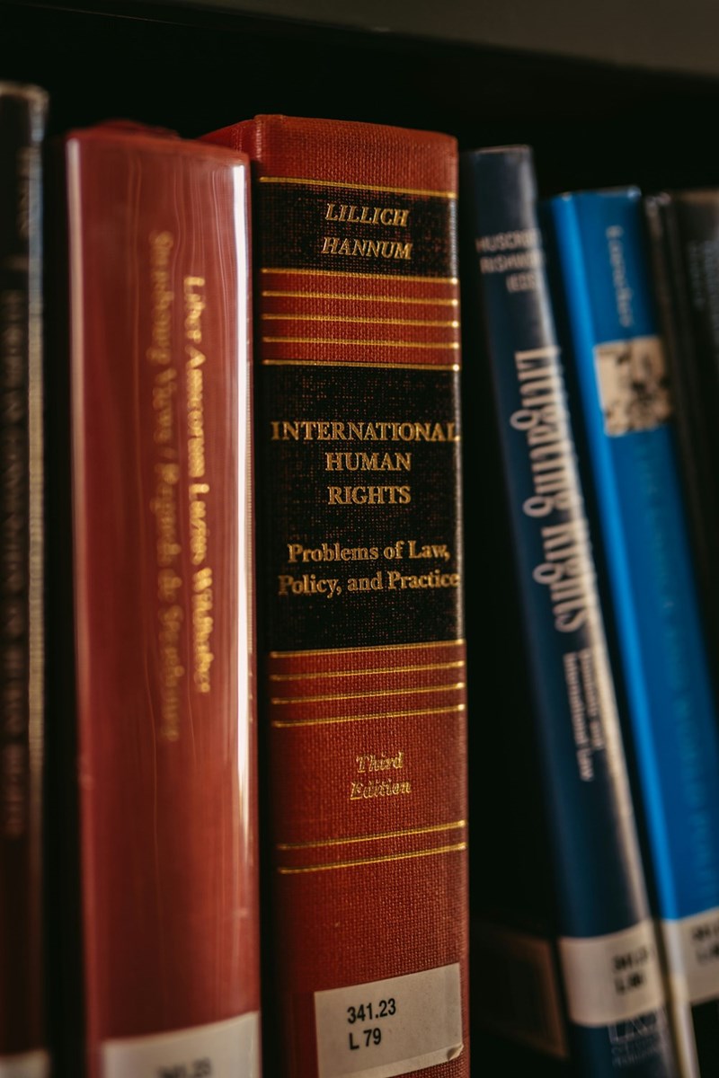 Law books representing a daughter’s decision to leave law school and the family tension surrounding her career path.