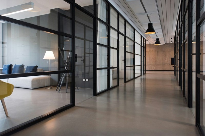 Visual representation of a closed office with window walls.