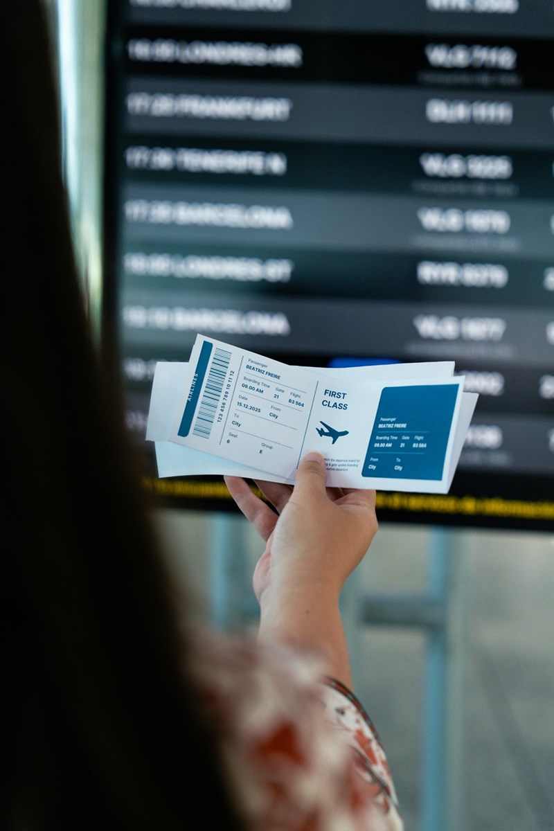 A sister's boarding pass for a long-distance trip to visit family and spend time with a younger sibling.