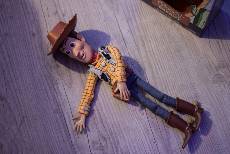 Toy Story toy on the floor.