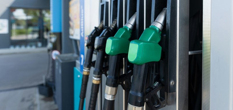 This model depicts gas pumps at a fuel station, representing the gas money conflict behind a failed carpool arrangement.