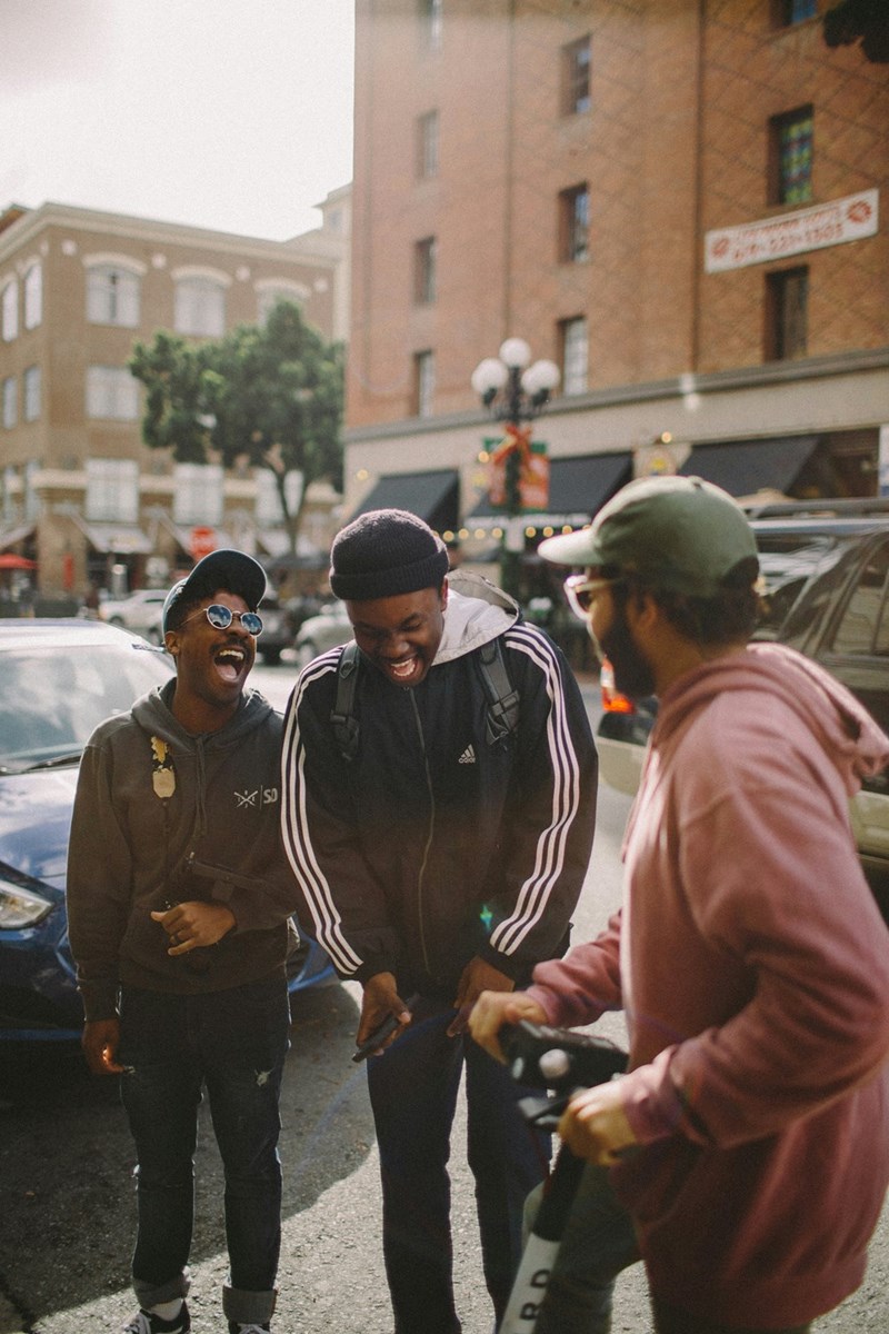 three men laughing