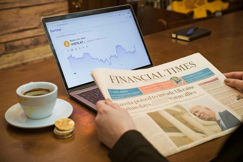 a person reading the Financial Times