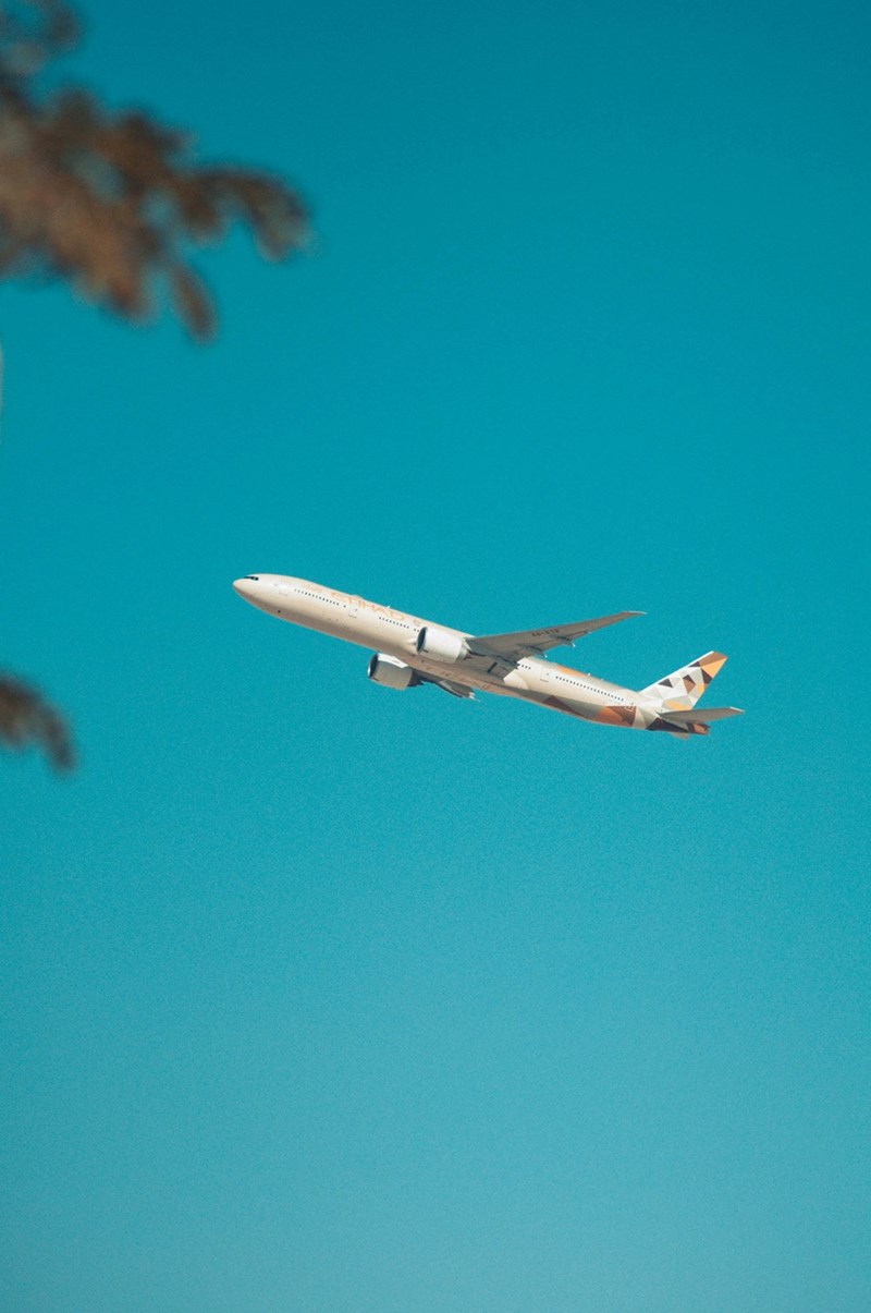 white airplane flying