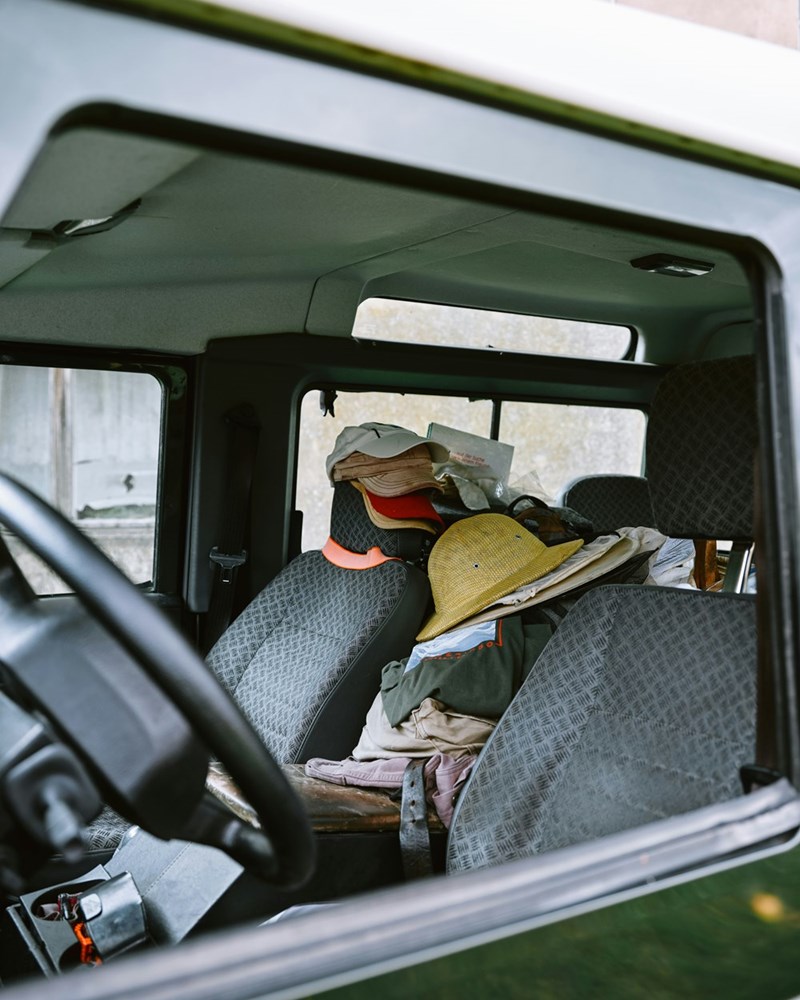 A cluttered vehicle interior filled with personal items reflects the kind of wear, mess, and neglect that can make someone hesitant to lend out their car.