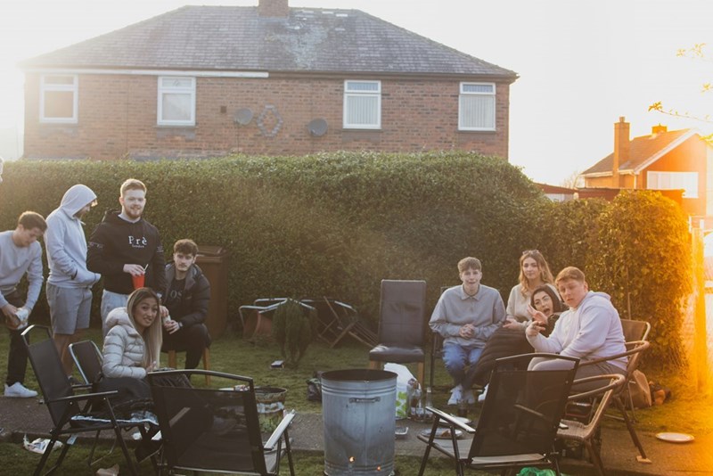 group of people talking to each other