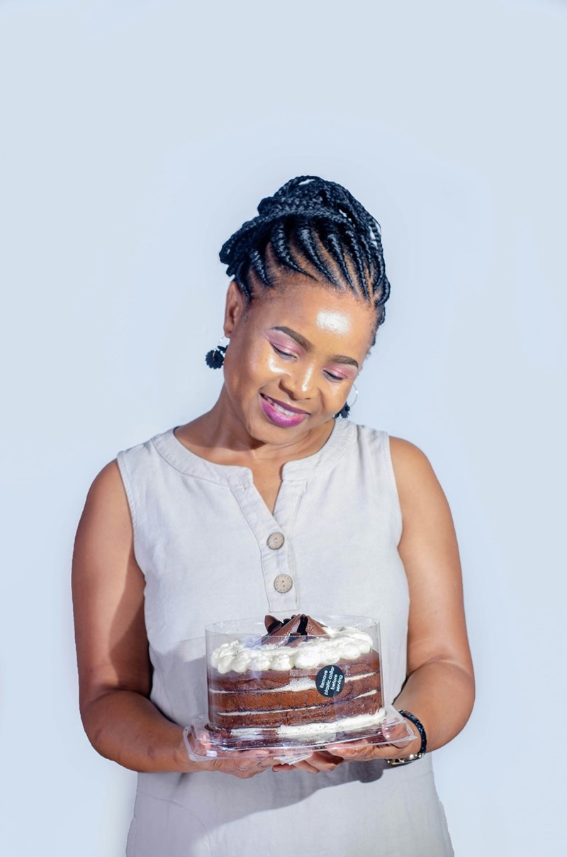 woman holding cake