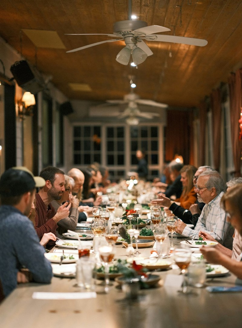 A family dinner, representing the awkward moment when a girlfriend’s sister makes snide comments in front of both families.