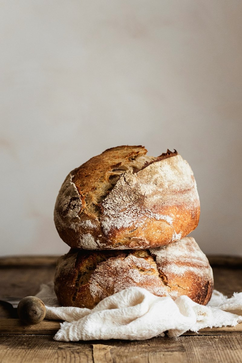Bread on a kitchen counter, representing the gluten foods that must stay out of a shared kitchen because of a gluten allergy.