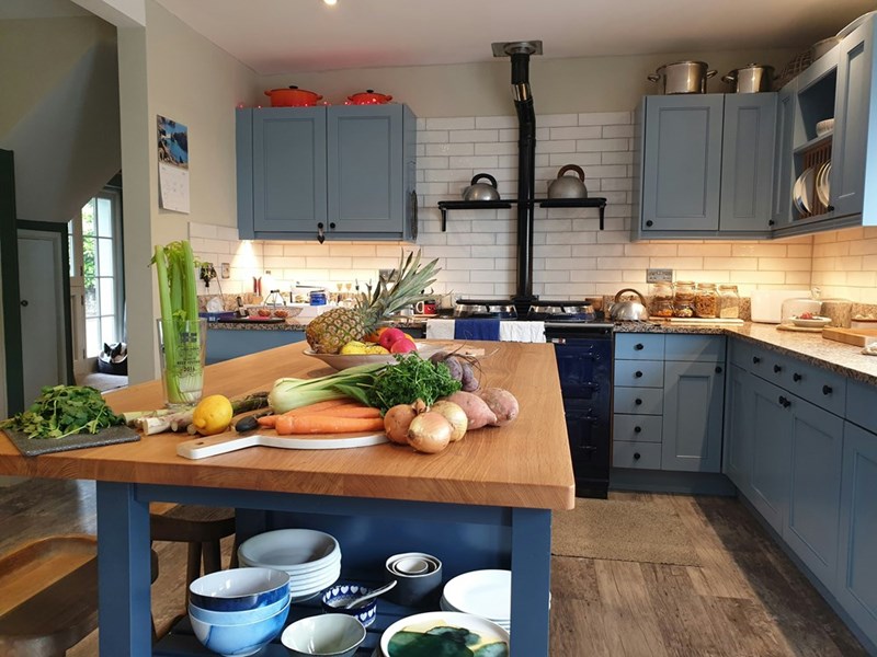 Gluten-free ingredients arranged in a kitchen, representing the strict food rules needed to prevent cross-contact.